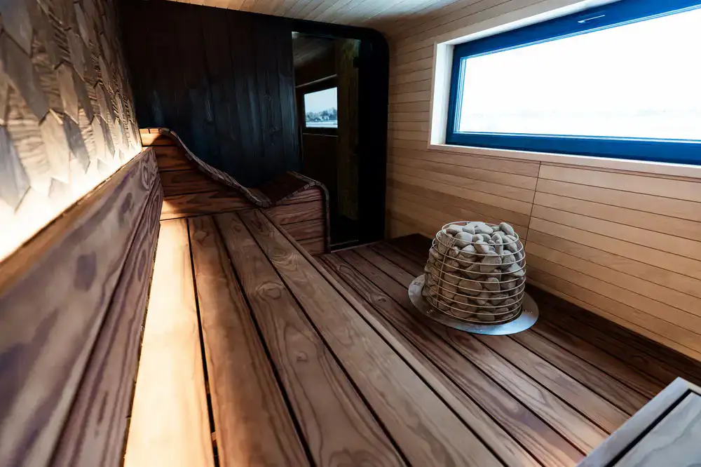The wooden sauna building at our waterside spot