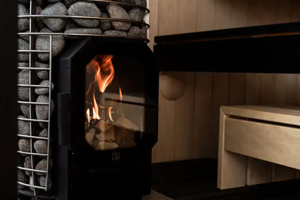 Close up of hot stones in a wood-fired stove